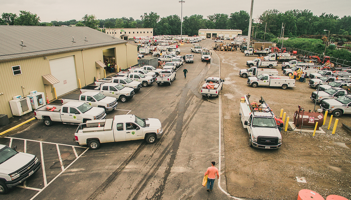 Our fleet of cranes, box trucks, and bucket trucks at our New River Electrical headquarters.
